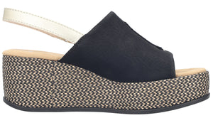 Black platform sandal with a woven platform and gold slingback strap.