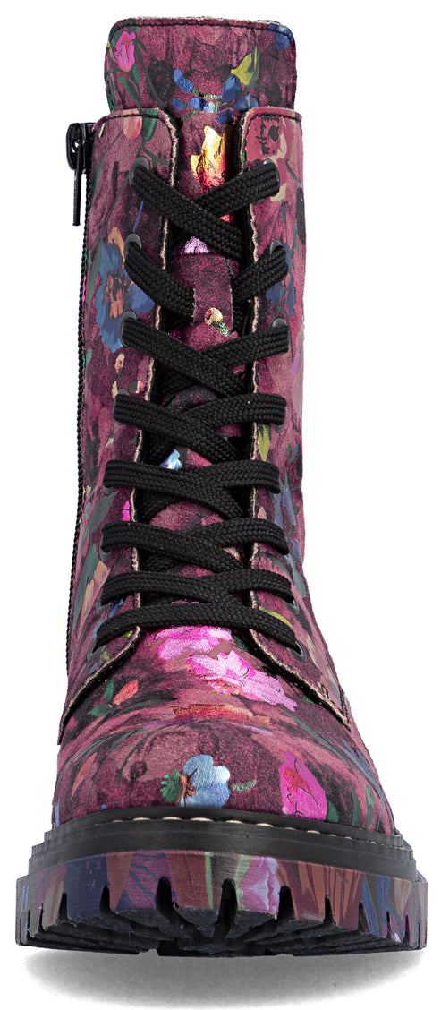 A floral patterned, mid-calf combat boot with black laces and a side zipper, set on a thick lug sole.
