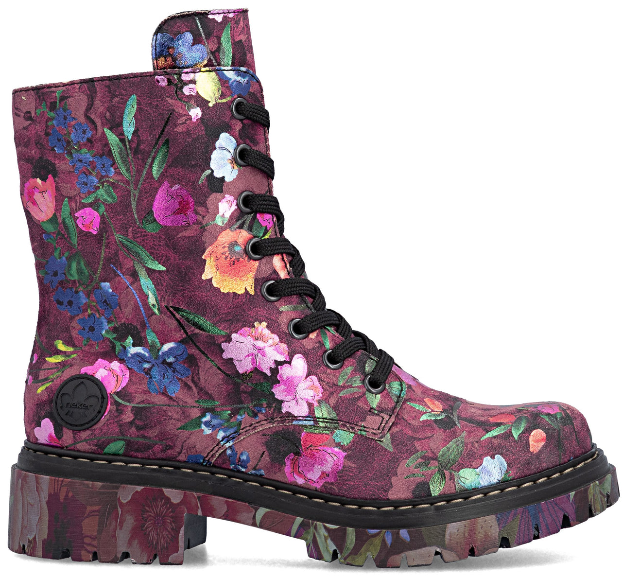 A maroon combat boot with a vibrant floral print featuring various flowers and leaves in shades of pink, orange, blue, and green, featuring black laces and a thick, matching floral-printed lug sole.