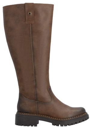 A brown leather, knee-high riding boot with a chunky, lugged dark brown outsole and a small strap detail with a metal rivet at the top.