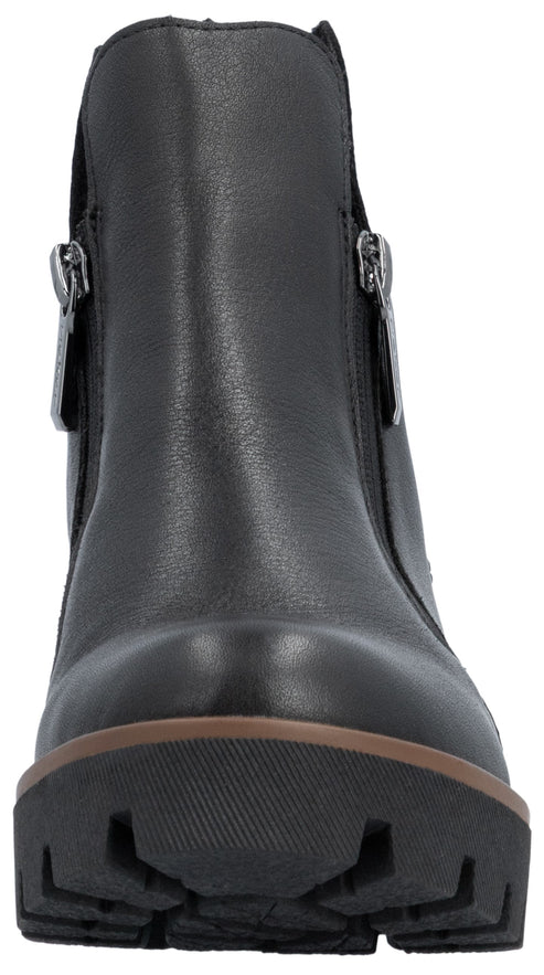 A black ankle boot with a rugged, thick-treaded black lug sole, a light brown midsole, and dual metallic zippers on either side.