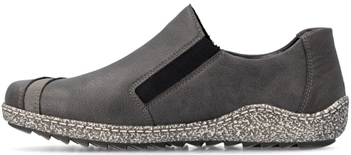 A gray slip-on shoe with a textured, speckled, light-colored midsole, a black elastic side gore panel, and a small darker gray accent band across the toe.