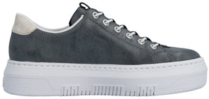 A gray leather sneaker with a white rubber sole and white laces.