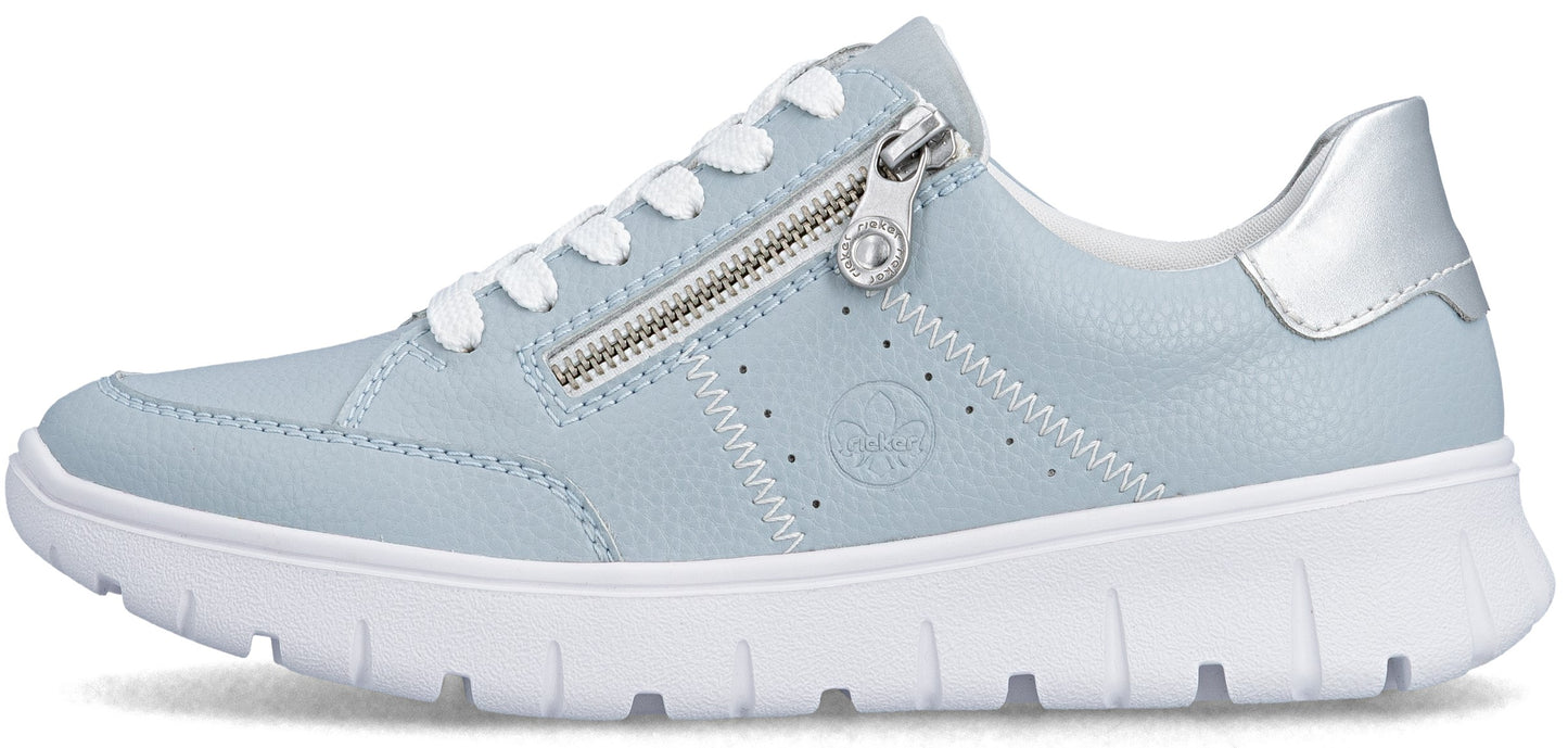 Light blue sneaker with a white sole and white laces, featuring a silver zipper and a silver accent on the heel.