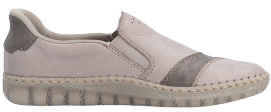 A slip-on shoe with a textured sole and a beige and gray upper.