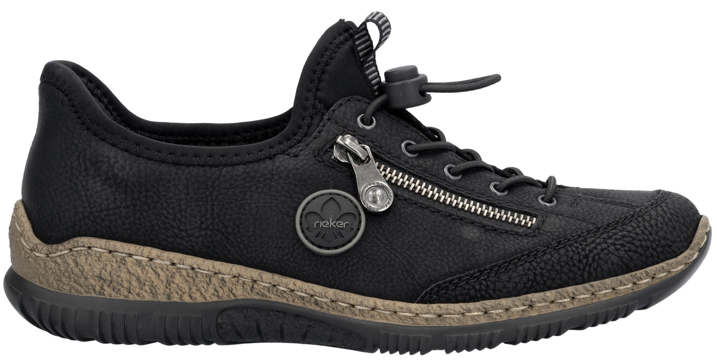 A black leather slip-on shoe with a side zipper detail, a toggle lace closure system, a textured beige midsole, and a black rubber outsole.
