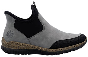 Gray slip-on shoe with black elastic side panels and toe.