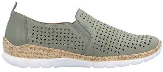 A sage-green slip-on shoe with decorative perforations, a cork midsole, and a white outsole.