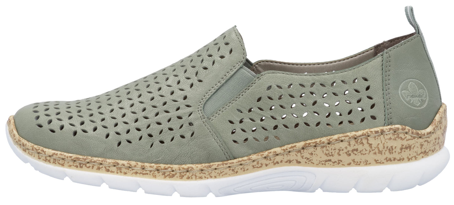 Perforated sage-colored slip-on shoe with a white sole.