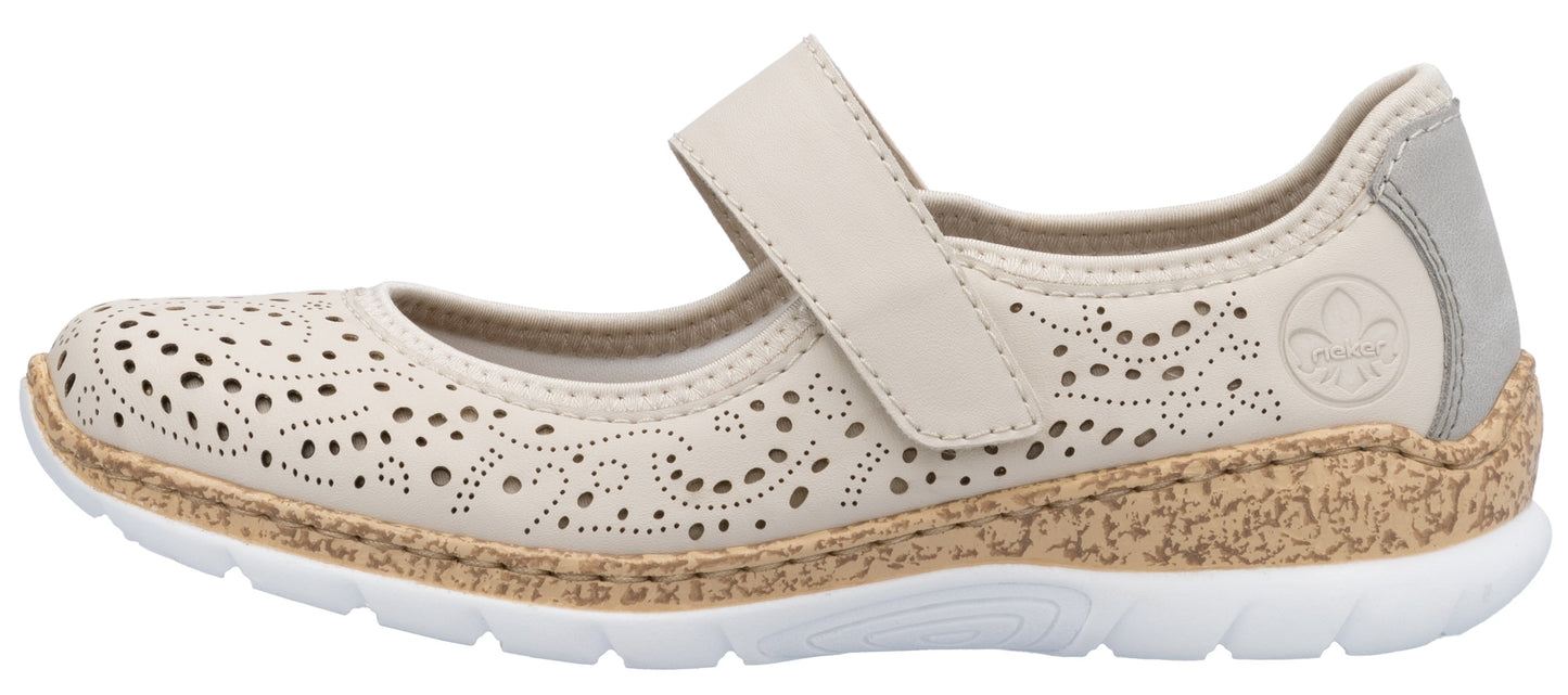 Beige flat with decorative cut-outs and hook and loop strap.