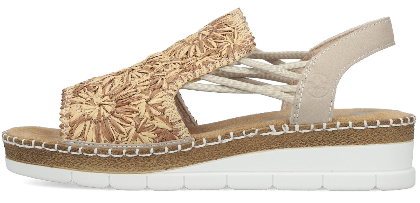 Beige strappy sandal with a thick woven upper and a platform sole.
