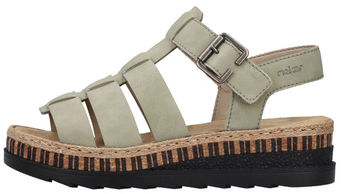 Green sandal with multiple horizontal straps and a cork platform with a black sole.