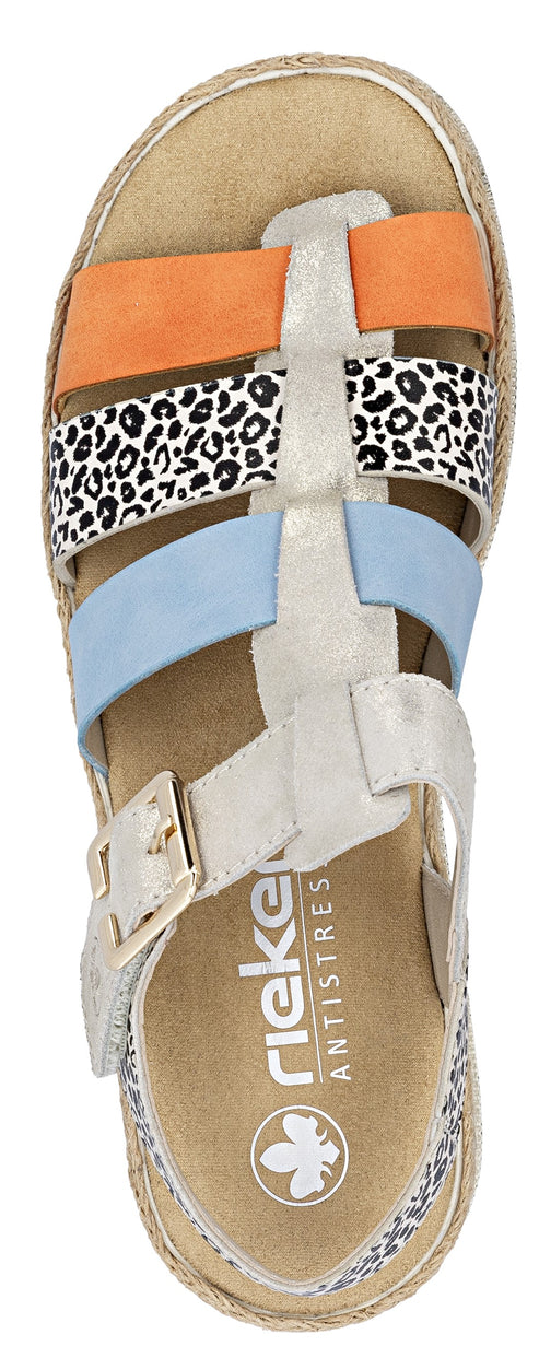 A sandal with an orange, leopard print, and light blue strap, with a white strap and silver buckle, featuring the Rieker Antistress logo.