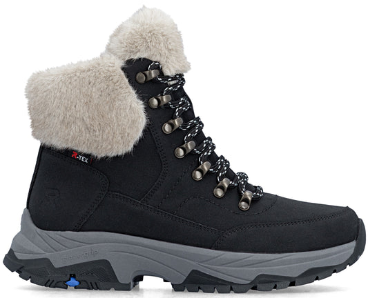 A black ankle-high winter boot with a grey lug sole and blue detail on the heel, featuring a fluffy light beige faux-fur collar, a lace-up front with dark metal eyelets, and an R-TEX label on the side.