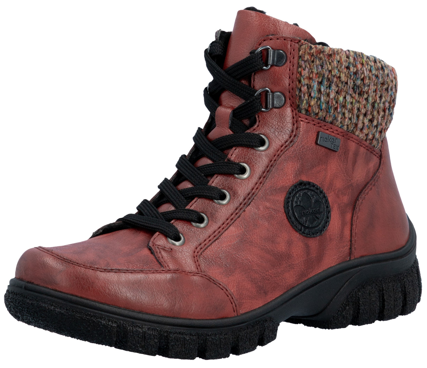 A red leather ankle boot with black laces, a textured knit cuff around the collar, a black lugged rubber sole, and a round black logo badge on the side.