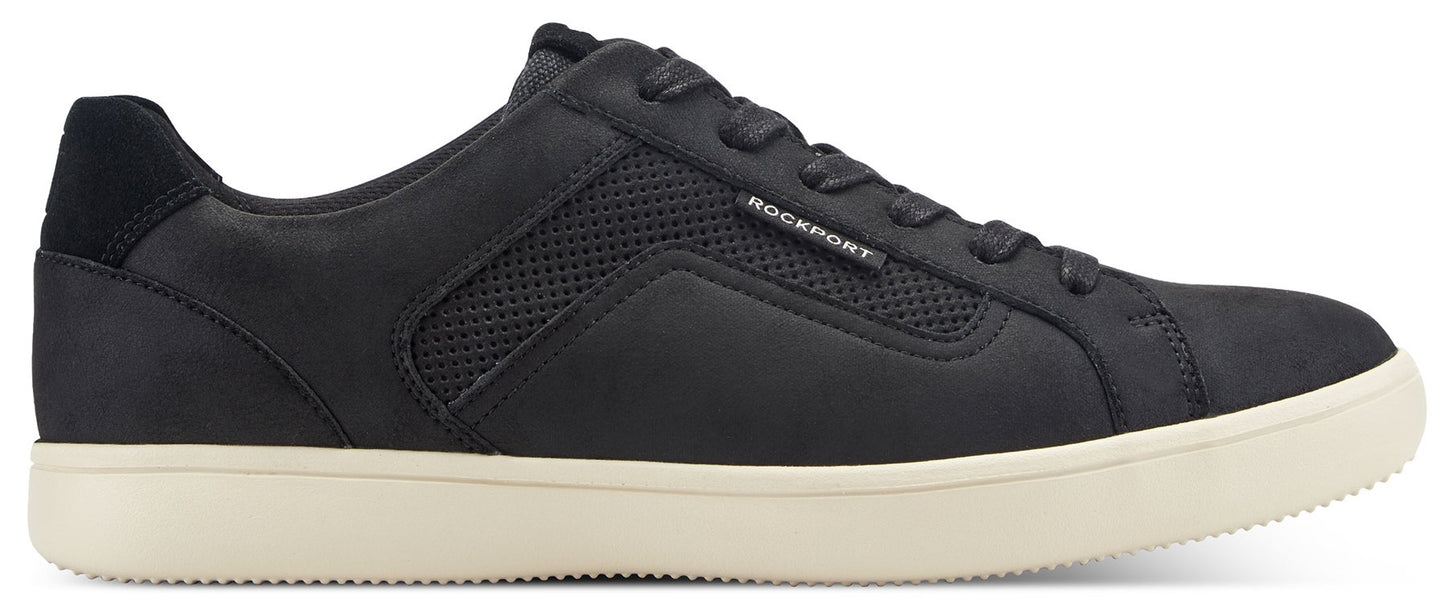 A black sneaker with a beige sole.