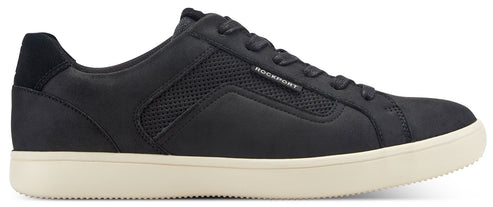 A black sneaker with a beige sole.