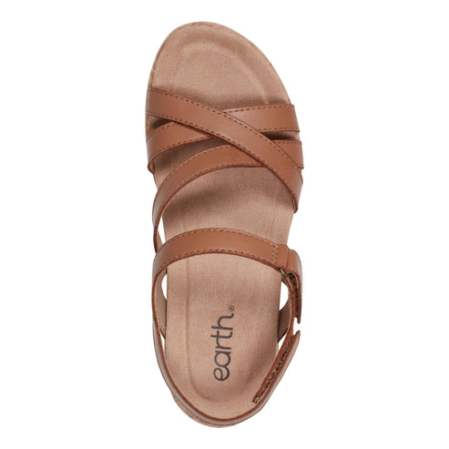 Top-down view of a brown sandal featuring cross-over straps and the "earth." logo on the footbed.