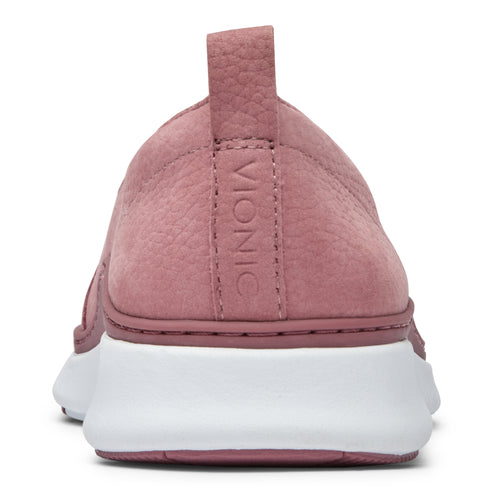 Back of rose-colored slip-on shoe with white sole and vertical embossed 'VIONIC' on the back.