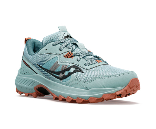 Light blue trail running shoe with black logo and orange sole.