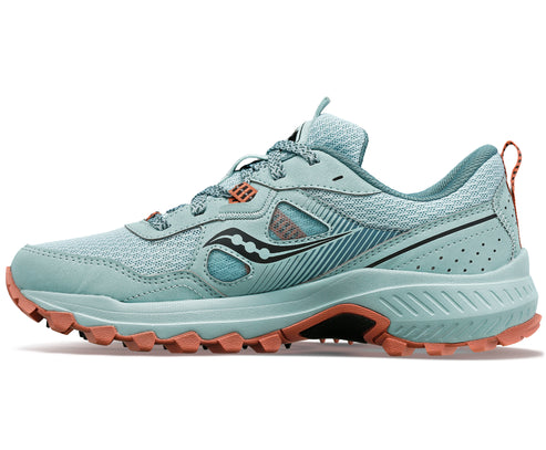 A light green running shoe with black stripes and coral-colored sole.