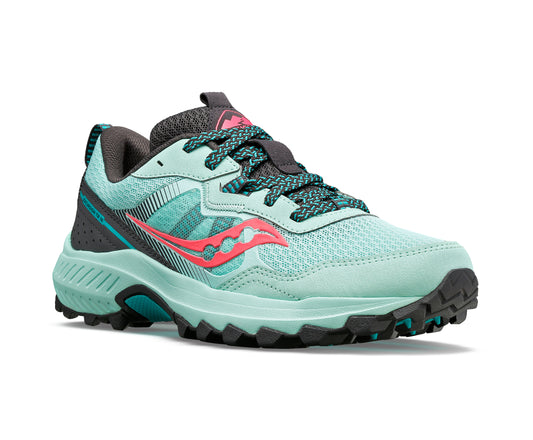 Light green sneaker with coral accent, lug sole and black laces.