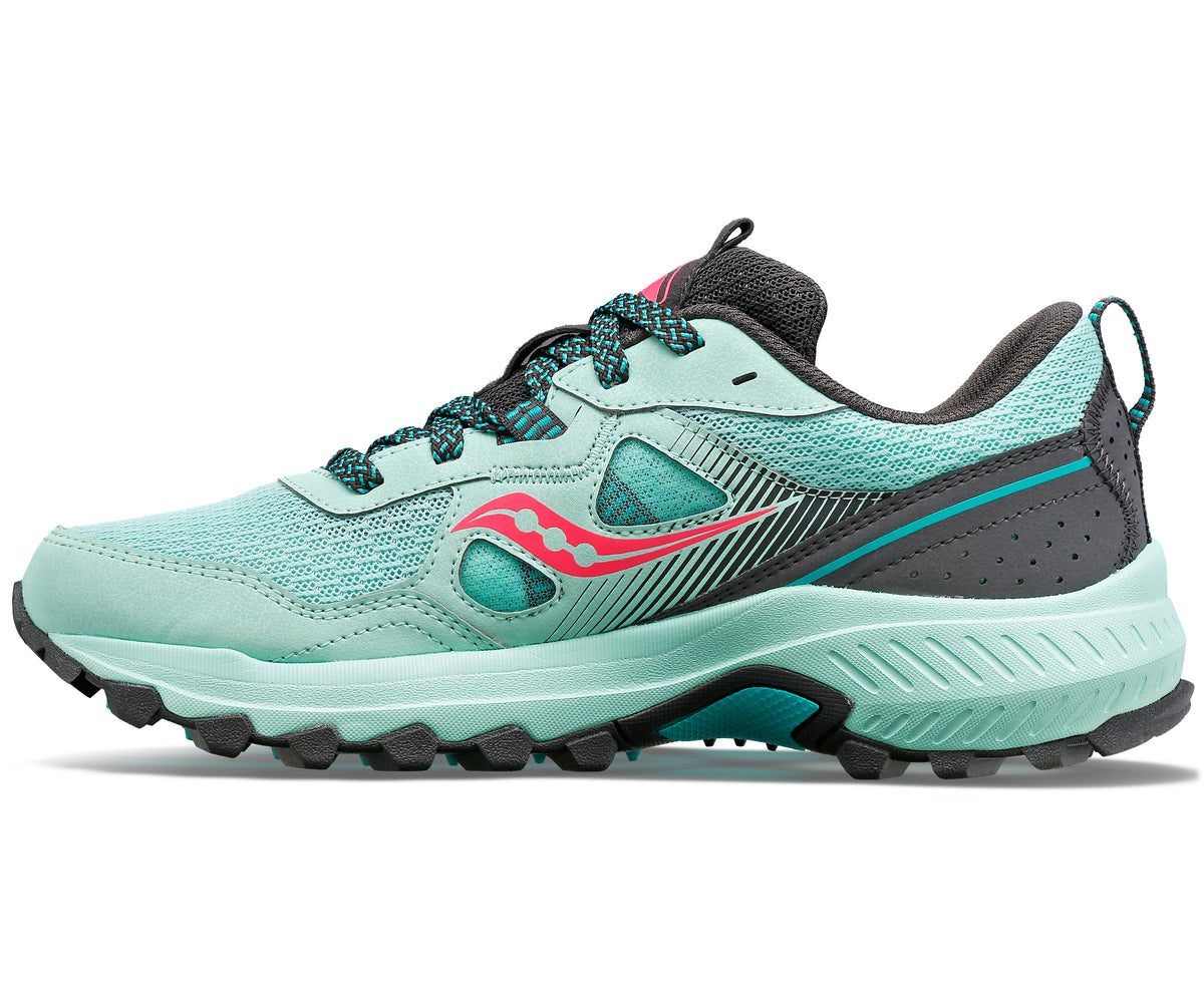 A mint-green running shoe with a red logo on the side and a patterned lace