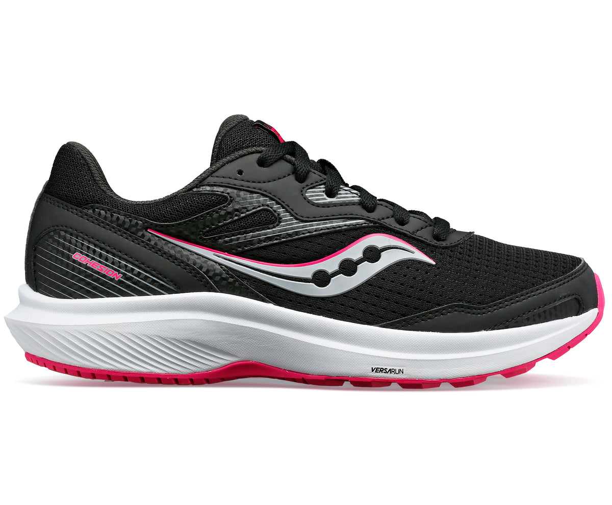 A black running shoe with a white sole and pink accents.