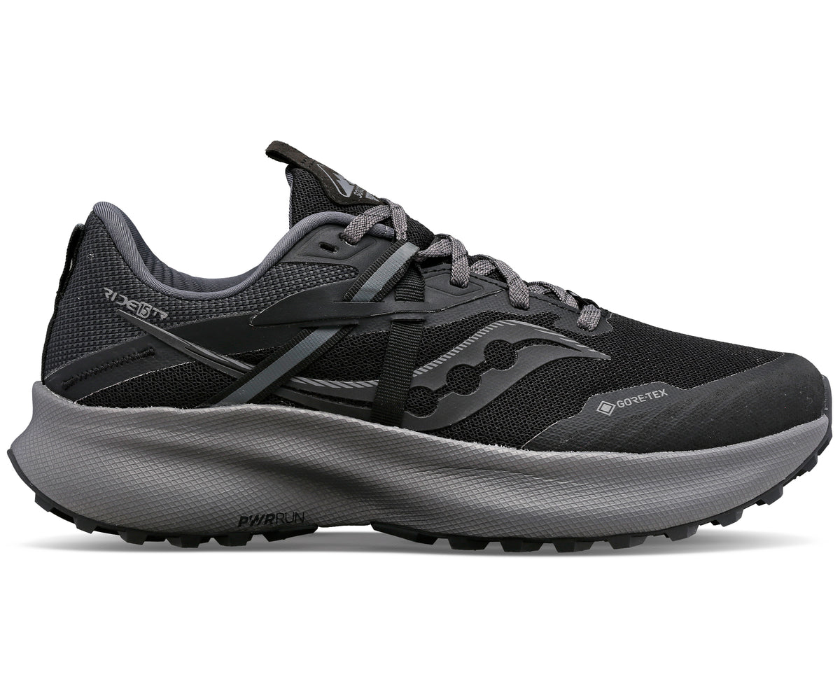 Black running shoe with grey sole, visible Gore-Tex logo.