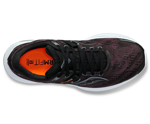 Overhead view of a running shoe in dark shades with black laces, white midsole, and orange inner lining.