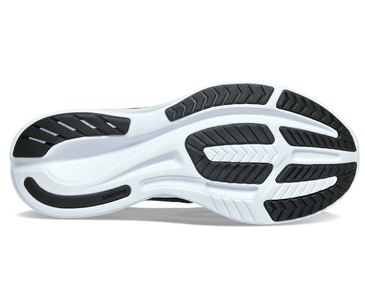 Bottom view of a shoe with a white sole and black tread.