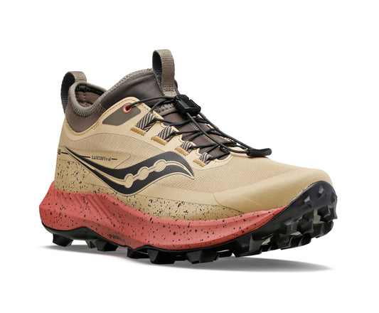 Tan running shoe with a speckled orange sole and black logo.
