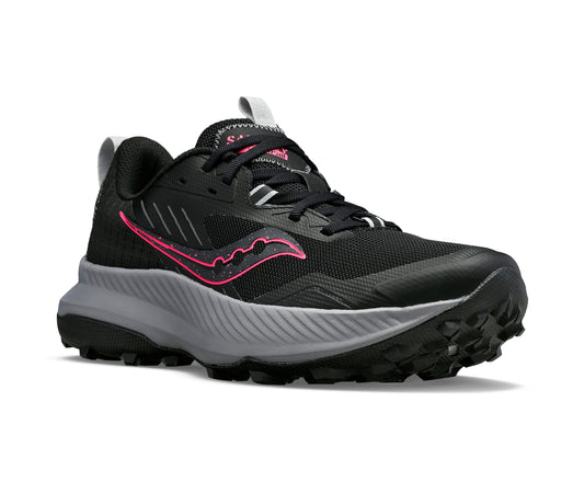 Black trail running shoe with pink accents and lugged sole.