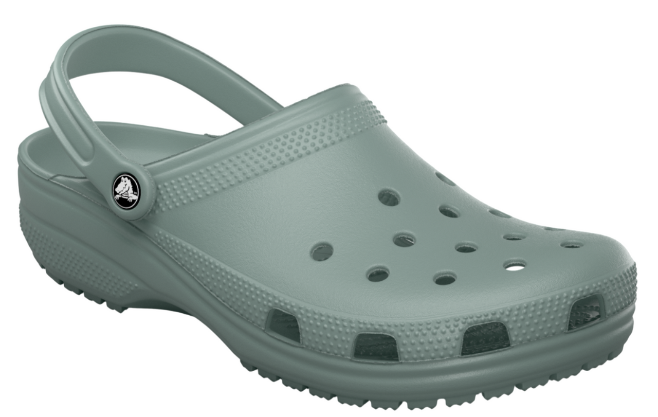 Sage-green clog shoe with heel strap and multiple holes.