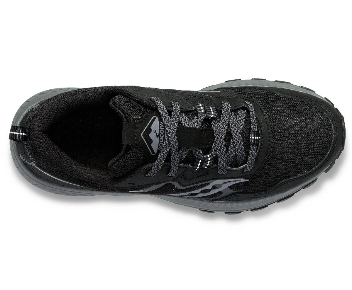 Overhead view of a black athletic shoe with a gray sole and laces.