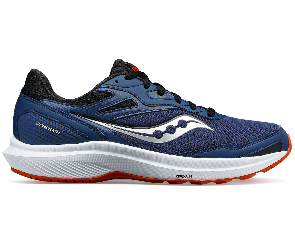 Blue running shoe with white midsole and orange outsole, featuring a silver logo and black lining.