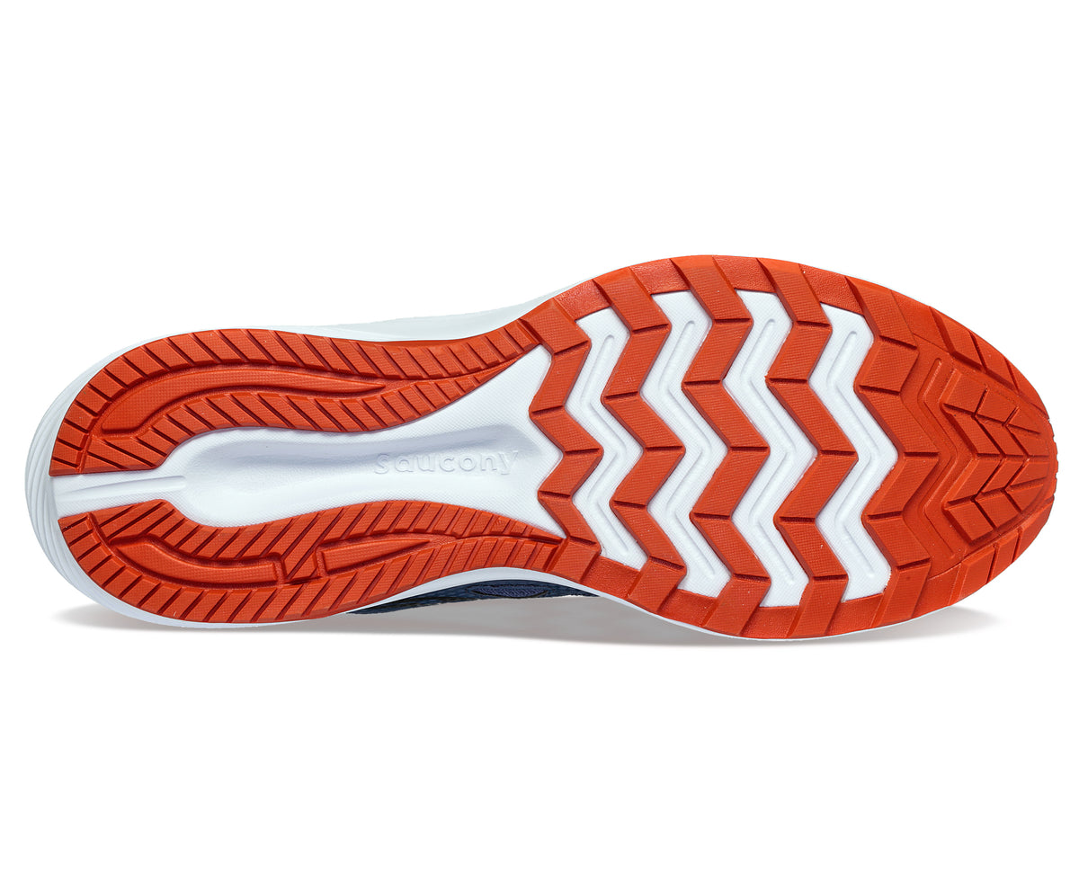 Bottom of running shoe with orange zig-zag patterned sole and white midsole.
