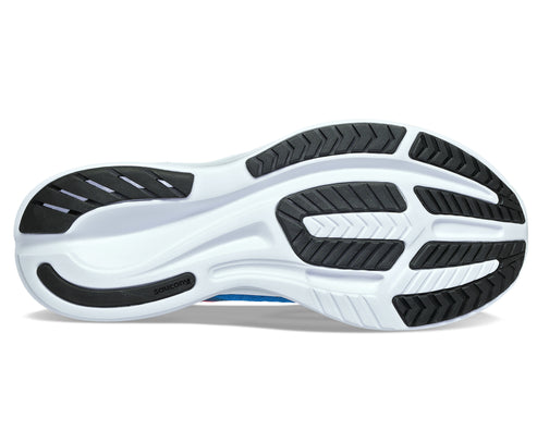 Close-up of shoe sole with white foam and black rubber traction pads.