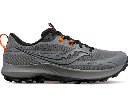 Trail running shoe, gray with orange accents, black sole, side logo and "SAUCONY TRAIL" text