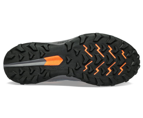 Bottom view of a grey athletic shoe featuring a black patterned sole with orange accents.