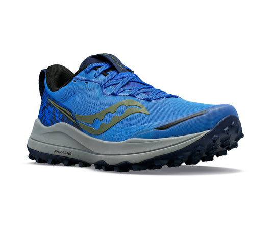 Blue trail running shoe with lugged outsole and gray midsole.