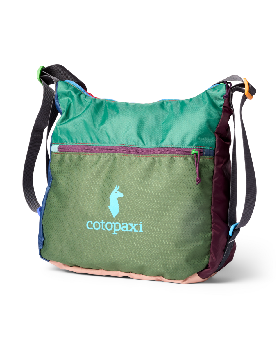 A green, purple, and pink crossbody bag with the word "cotopaxi" and a llama logo.