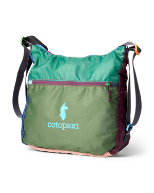 A green, purple, and pink crossbody bag with the word "cotopaxi" and a llama logo.