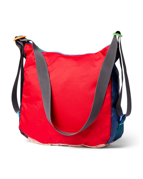 Red, blue, green and beige messenger bag with gray straps.