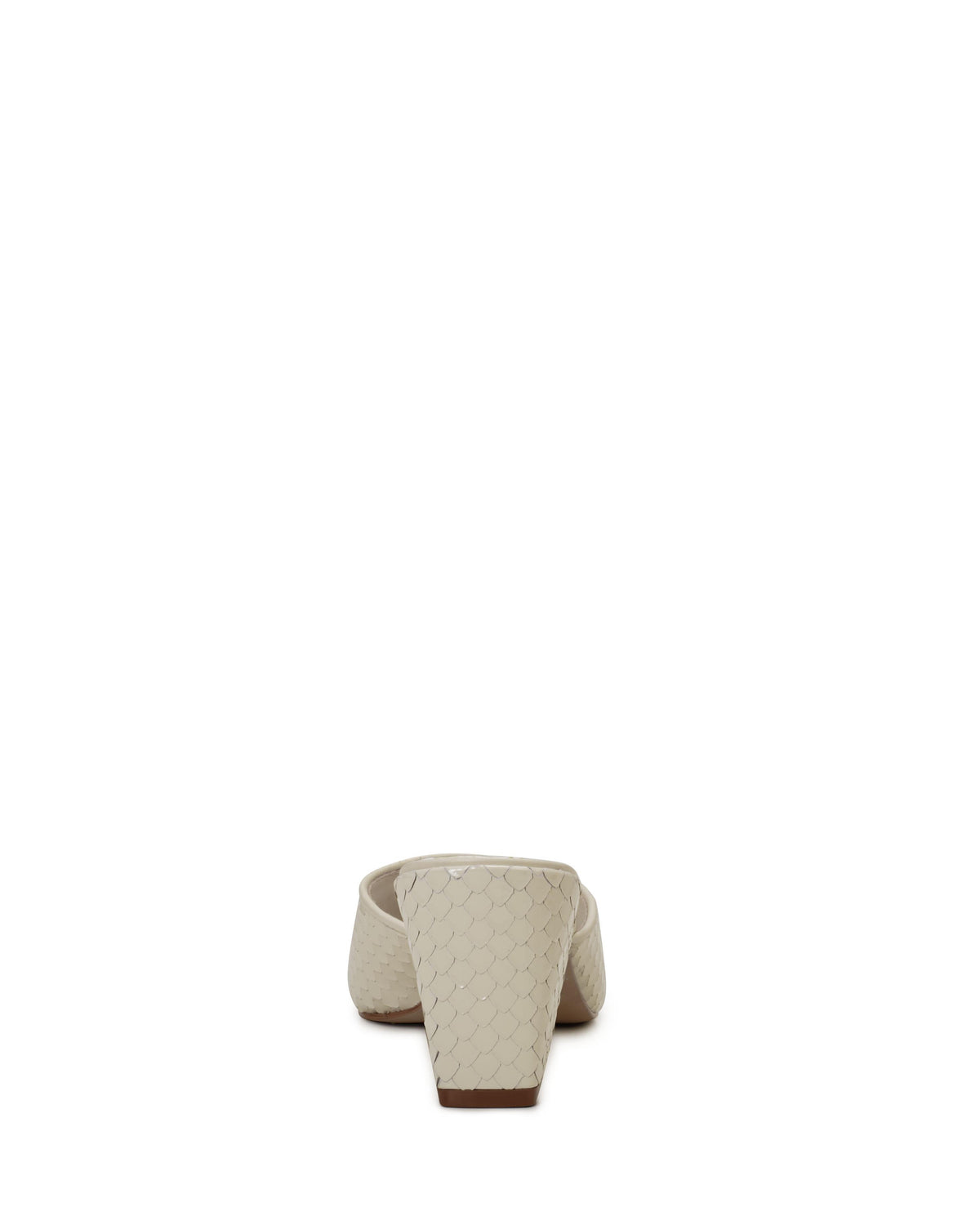 Beige mule with a block heel.