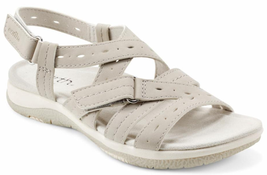 Slingback sandal in light taupe featuring adjustable straps with buckle and velcro closures.