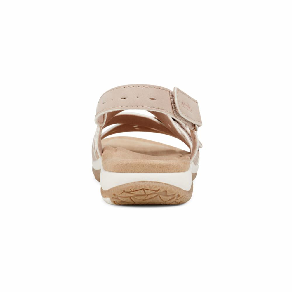 Tan sandal with velcro strap, beige footbed, and white sole.
