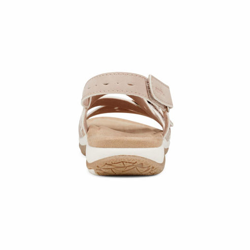 Tan sandal with velcro strap, beige footbed, and white sole.