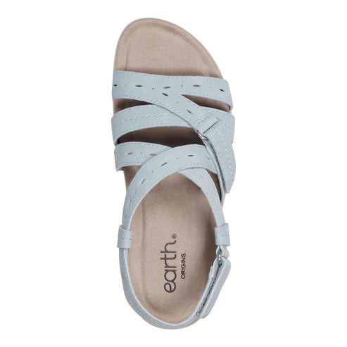 Light blue sandal with crossed straps and "earth. ORIGINS" logo.