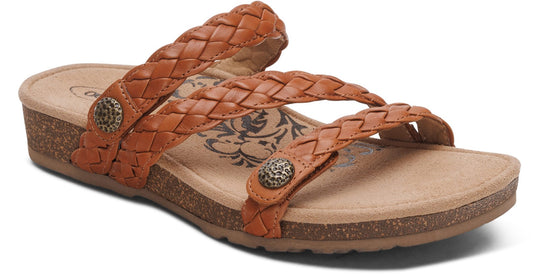 Brown braided slide sandal with two straps and decorative buttons on a cork sole.